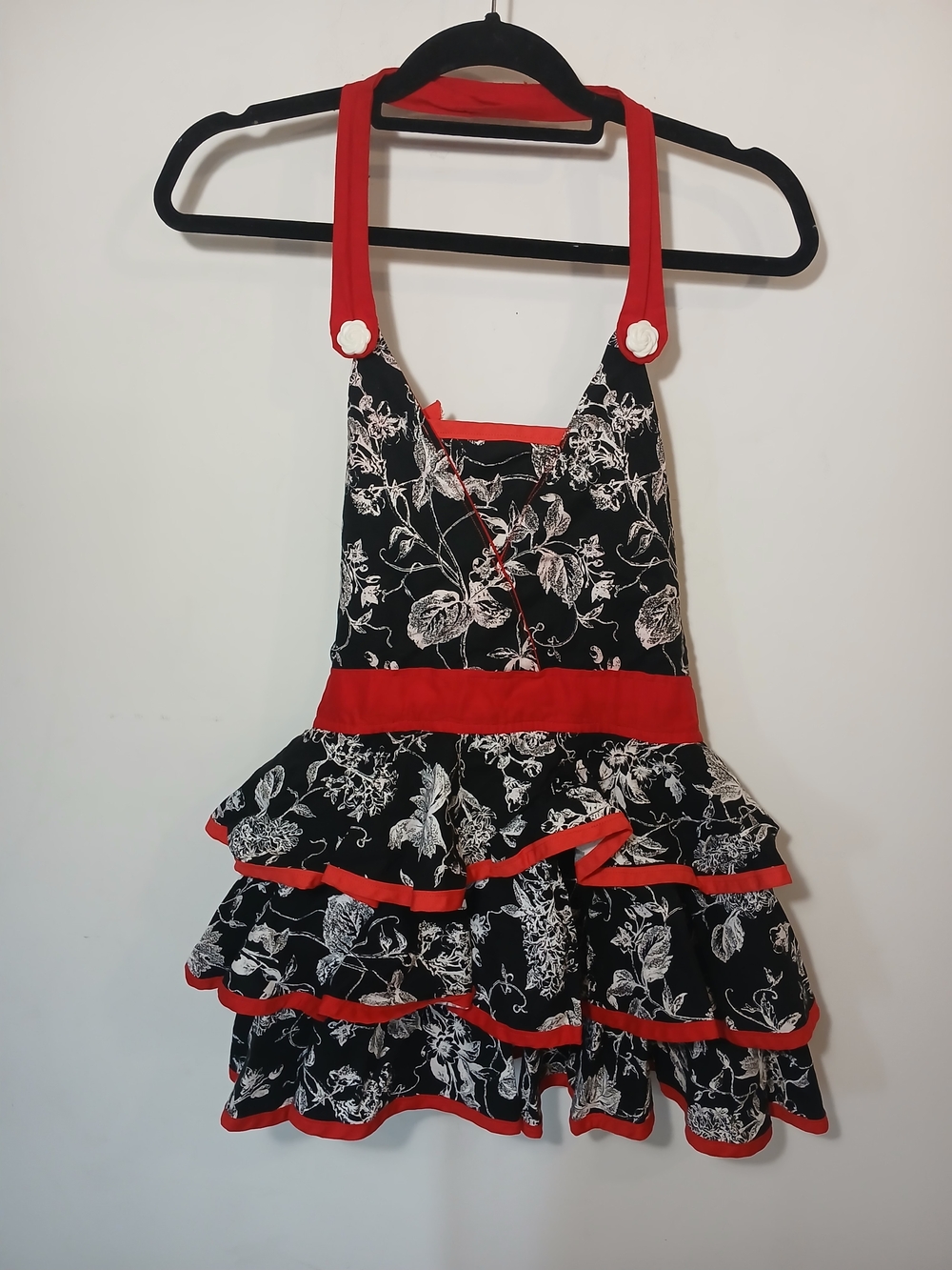 Black Floral Ruffle Apron Dress with Red Trim